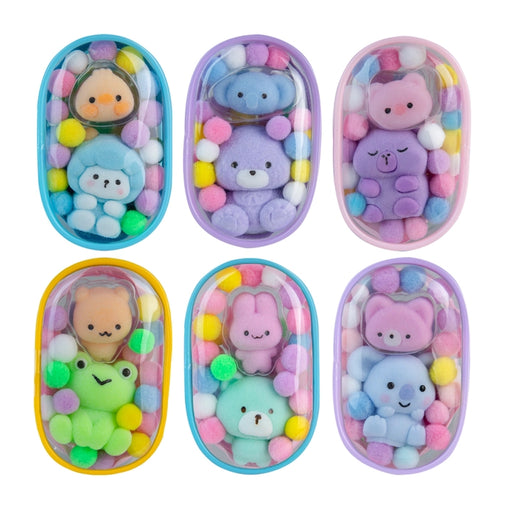 Set of colorful toy figures in small cases on a white background