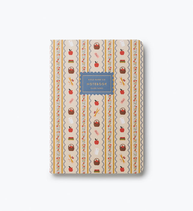 Notebook with a colorful striped pattern on a white background