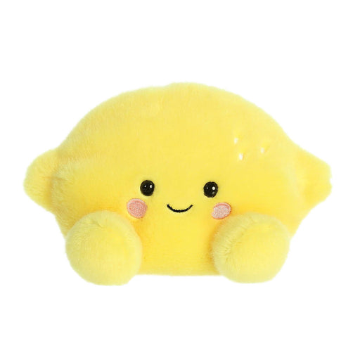 Plush toy lemon with a smiling face on a white background