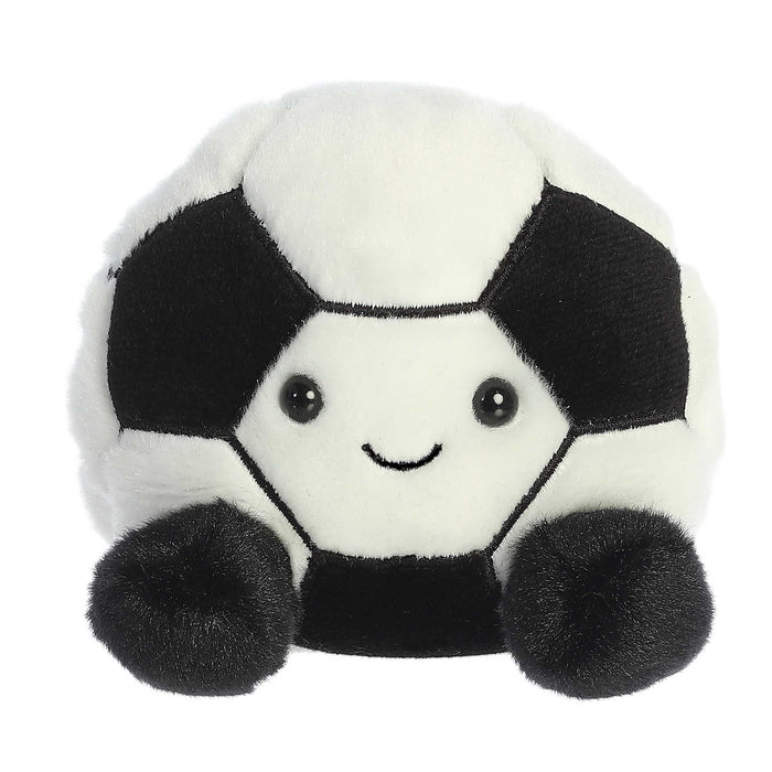 Plush toy shaped like a soccer ball with a smiling face on a white background