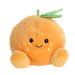 Plush toy resembling a carrot with a smiling face on a white background