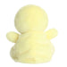 Yellow plush duck toy on a white background