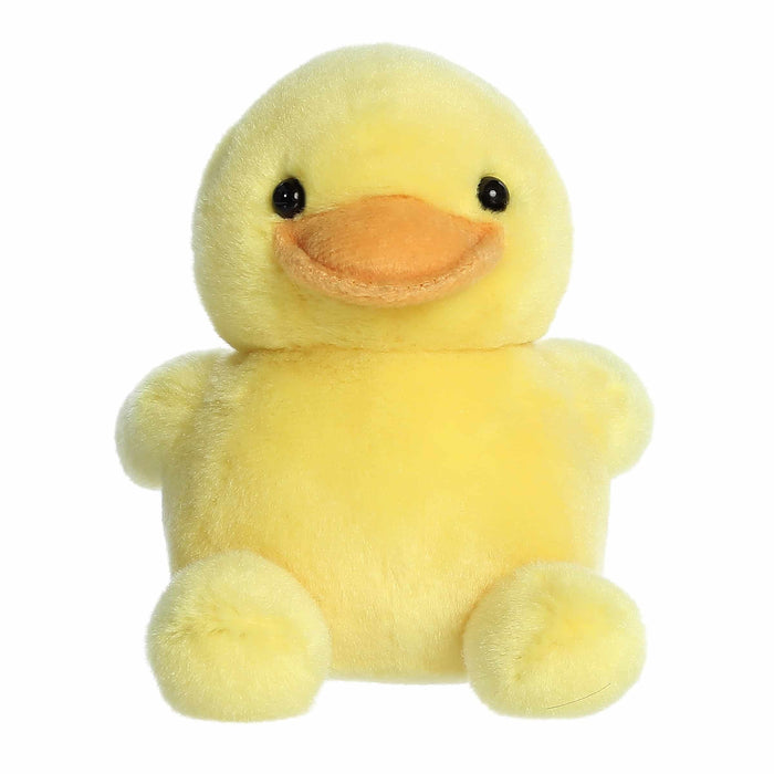 Yellow plush duck toy on a white background