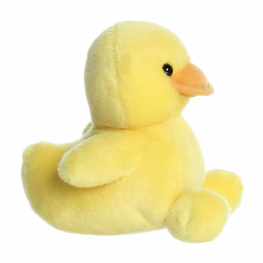 Yellow plush duck toy on a white background
