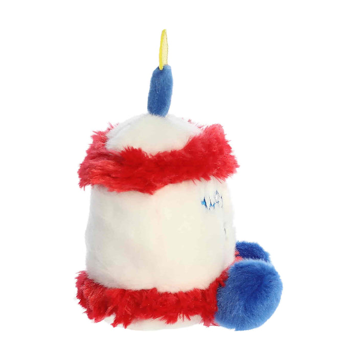 Plush toy resembling a character with red and blue accents on a white background