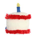 Plush toy shaped like a birthday cake with a candle on a white background