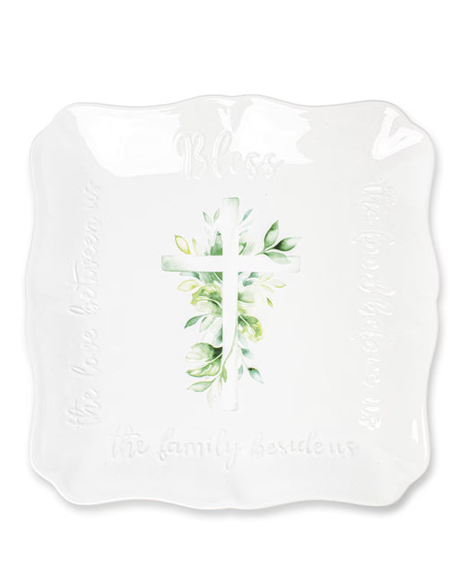 White bib with floral design and text on a white background