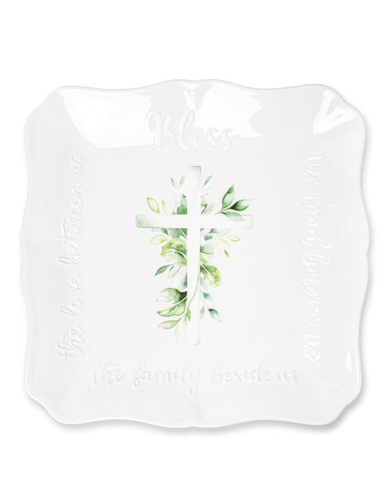 White bib with floral design and text on a white background