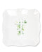 White bib with floral design and text on a white background