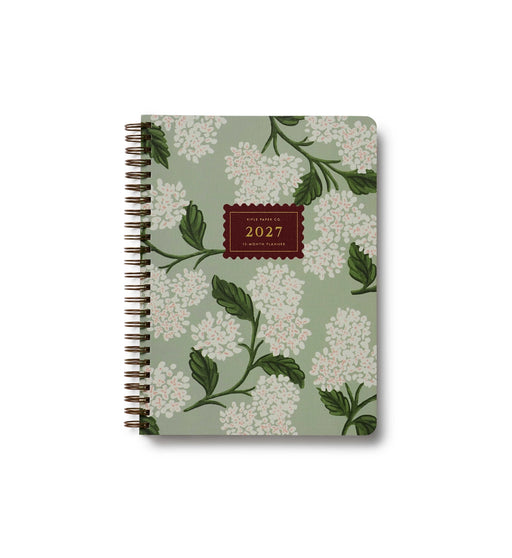 Floral patterned notebook with '2027' on a white background