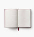 Open notebook with lined pages on a white background