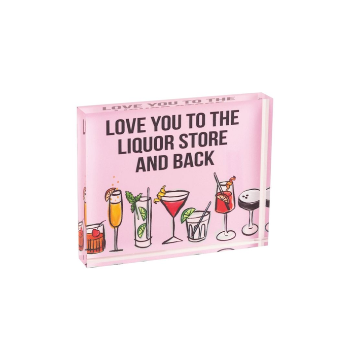 Pink glass block with cocktail illustrations and text on a white background