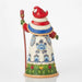 Colorful gnome figurine with a red hat and floral design on a white background
