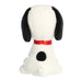 Plush dog toy with a red collar on a white background