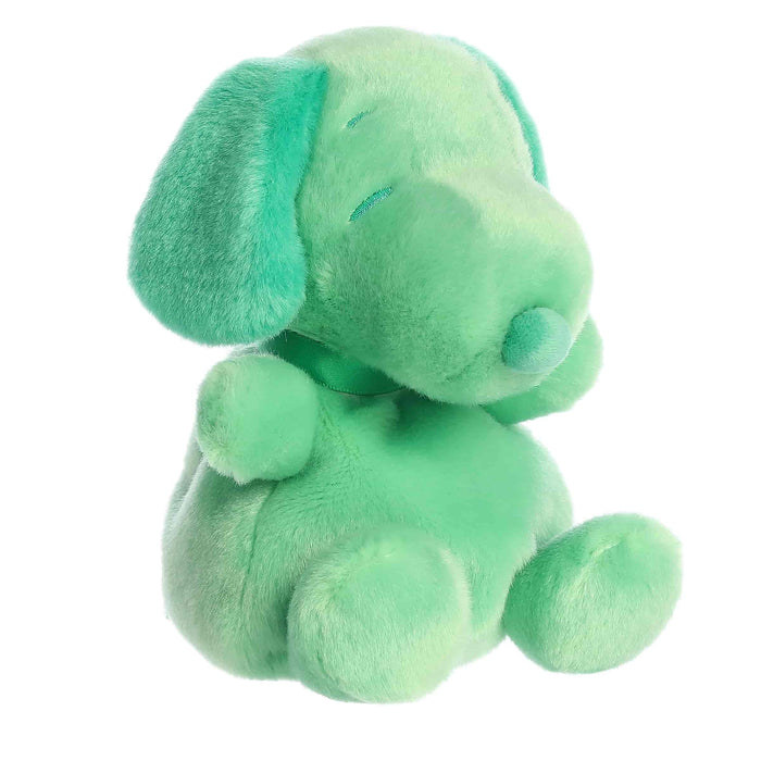 Green plush dog toy on a white background