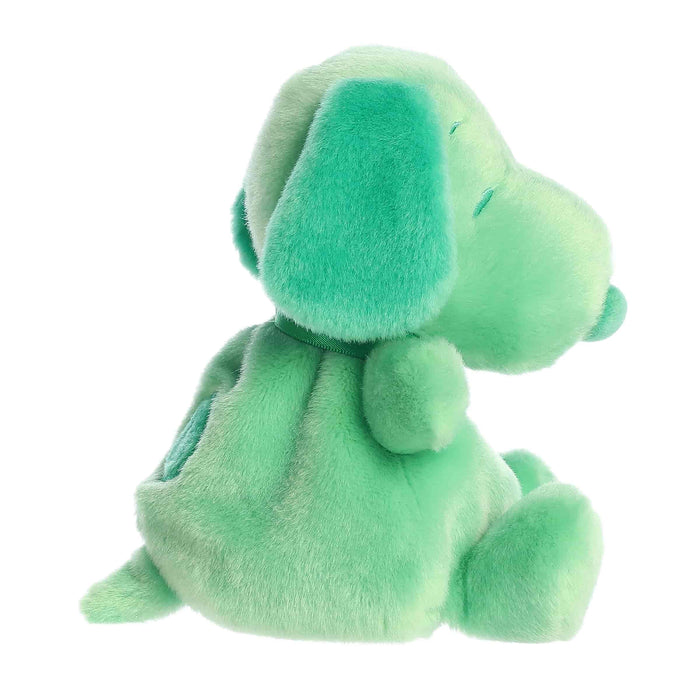 Green plush toy on a white background