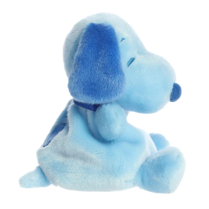 Blue plush dog toy on a white background