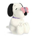 Plush toy of a dog with a butterfly on a white background