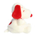 White plush toy with red accents on a white background