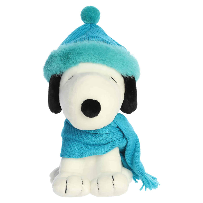 Snoopy plush with blue hat and blue scarf on a white background