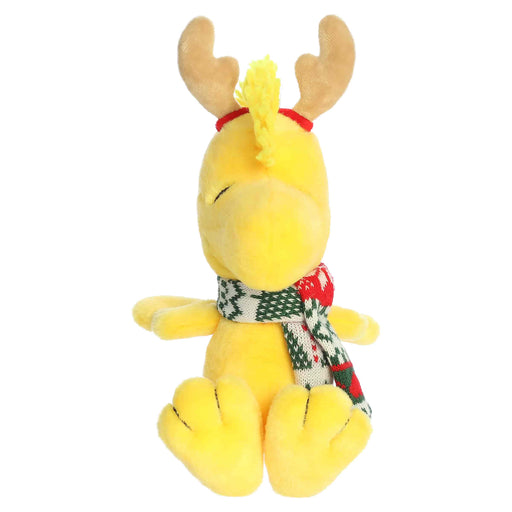Woodstock plush with reindeer antlers and a scarf on a white background