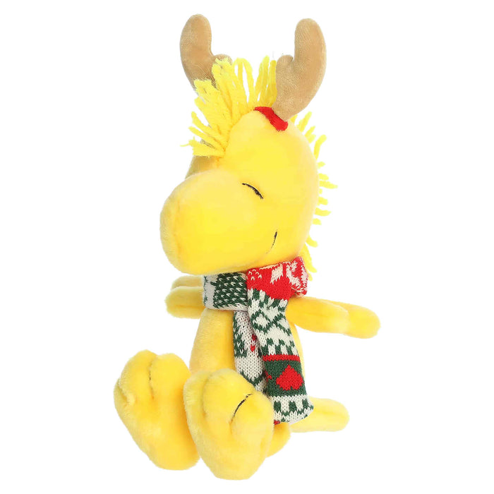 Woodstock plush with reindeer antlers and a scarf on a white background