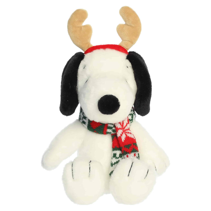 Snoopy plush with reindeer antlers and a scarf on a white background