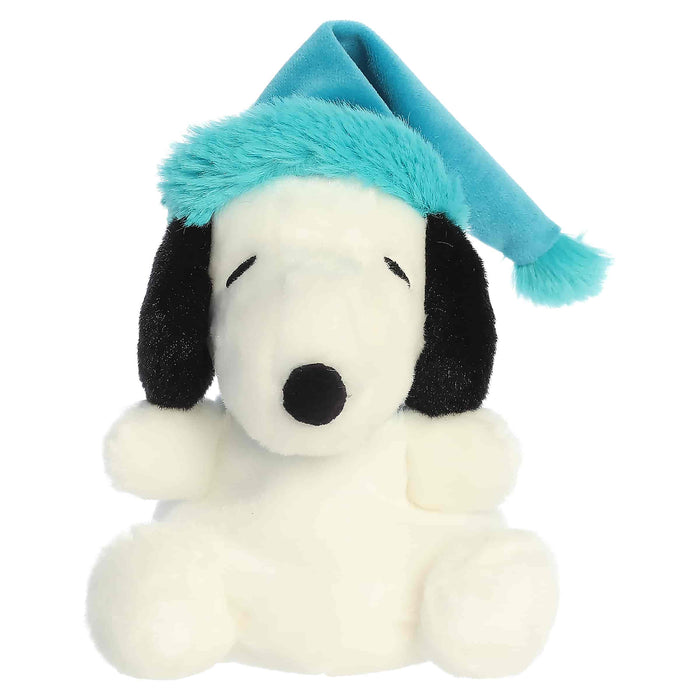 Snoopy plush toy with a blue winter hat on a white background