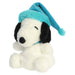 Snoopy plush toy with a blue winter hat on a white background