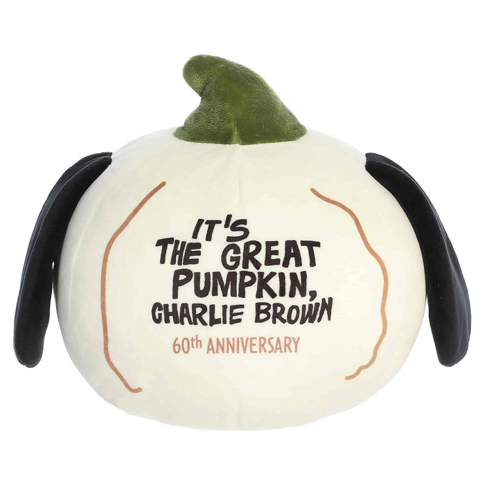 Pumpkin-shaped plush with 'It's the Great Pumpkin, Charlie Brown' text on a white background