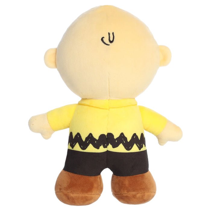 Charlie Brown plush toy on a white background