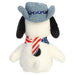 Snoopy plush toy with a cowboy hat and an American flag bandana on a white background