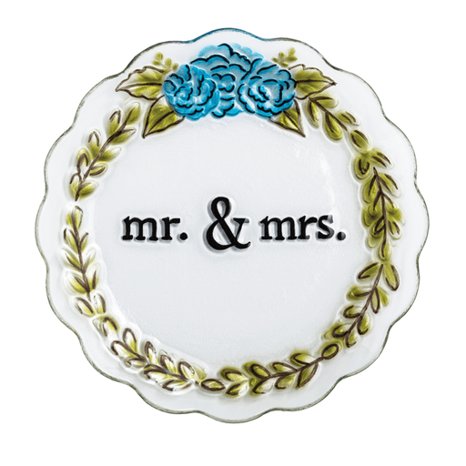 Decorative plate with 'mr. & mrs.' text and floral design on a white background