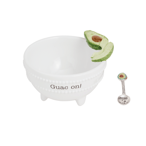 White bowl with 'Guac on!' text, half an avocado, and a small weight on a white background