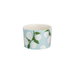 Small container with floral design on a light blue background