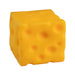 Yellow cube-shaped object resembling cheese on a white background