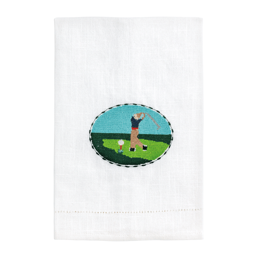 White towel with a golf-themed embroidered design on a white background