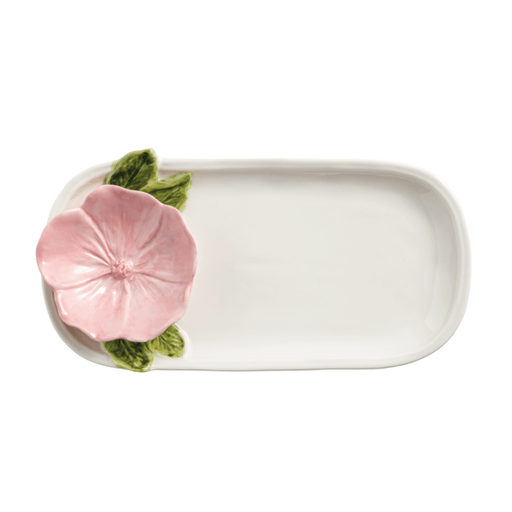 Rectangular white dish with pink floral design on a white background