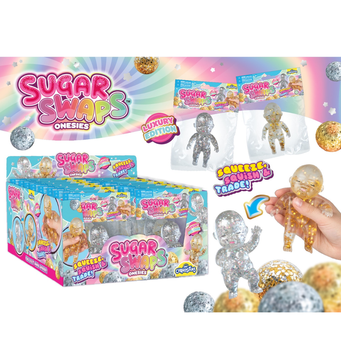 Sugar Swaps Onesies Squeezie Pop Luxury Edition toy packaging display with a large retail box, individual blister packs, and a hand holding a glittery squeeze doll, on a bright pastel background.