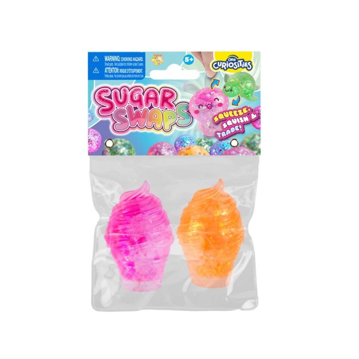 Packaged toy with pink and orange items against a white background