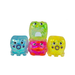 Three small, cute, squishy toy figures made of glittery translucent plastic, standing side-by-side on a plain white background. The left figure is light blue, the middle figure is split into green on top and pink on the bottom with a small orange mouth, and the right figure is yellow.