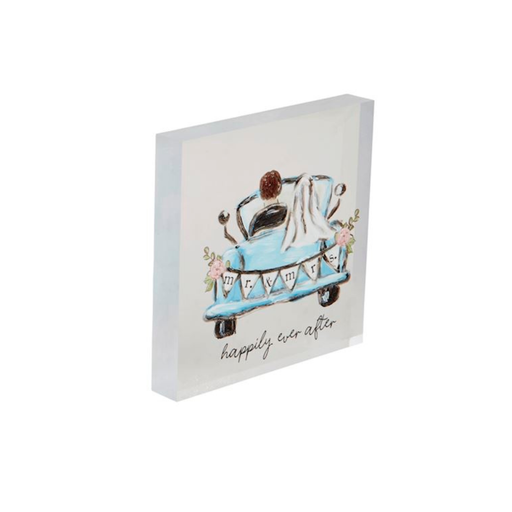 Decorative wall art with a wedding scene and 'happily ever after' text on a white background