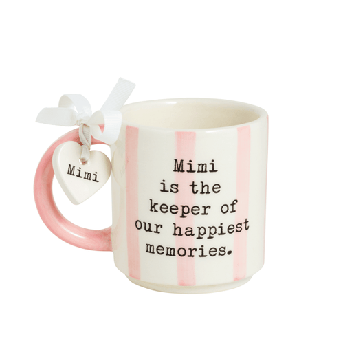 Mug with 'Mimi is the keeper of our happiest memories' text and pink handle on a white background