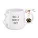 Cat-shaped mug with 'One cat short of crazy' text and paw charm on a white background