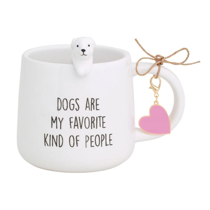 White mug with a dog-shaped handle and 'Dogs are my favorite kind of people' text, featuring a heart charm.