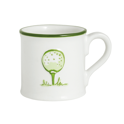 White mug with green rim and golf ball design on a white background
