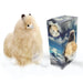 A fluffy cream-colored alpaca plush toy next to its retail packaging box, set against a plain white background.