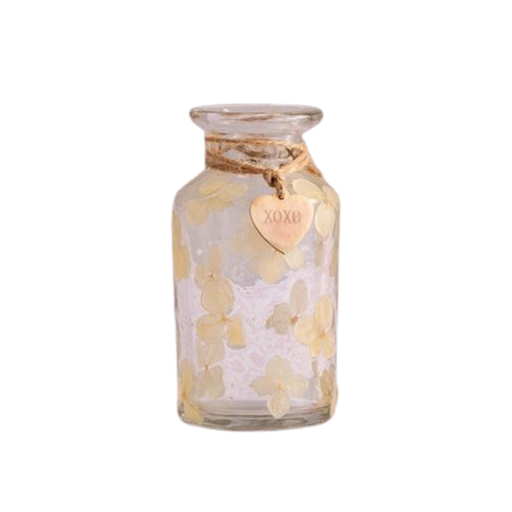 Glass jar with butterfly decorations and a heart-shaped tag on a white background