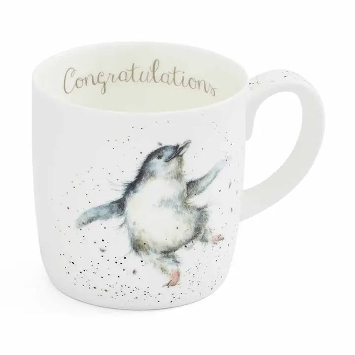 Mug with a penguin design and 'Congratulations' text on a white background