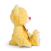 Yellow plush toy with a white tag on a white background
